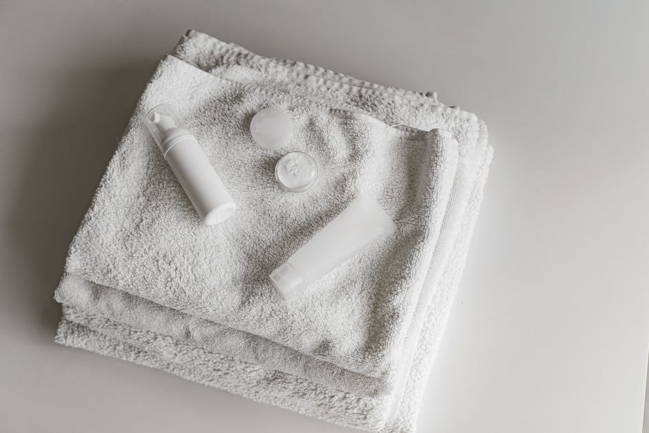 mantener las toallas organizadas en el baño